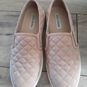 Steve Madden slip ons.